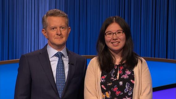 Jeopardy host Ken Jennings poses with Chemistry staff person Hakme Lee