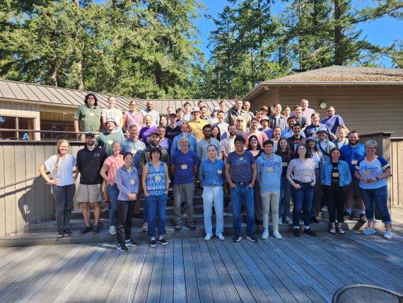 A group of more than 50 people pose for a photo