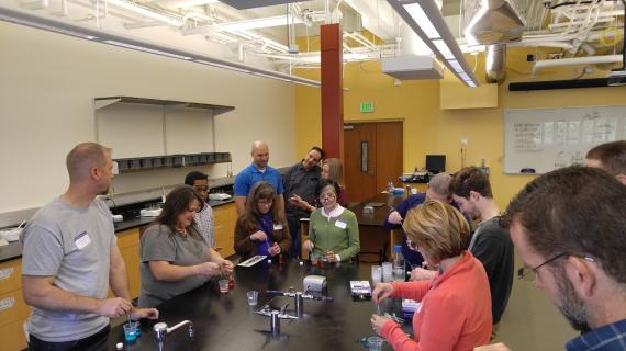 UWHS Chemistry 110 teachers participate in a low-cost and non-toxic activity that they can easily use to expose their students to polymer science.