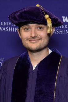 Matthew in his PhD regalia at graduation
