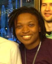 A cropped photo from 2013 of Jonesy standing among a group of people