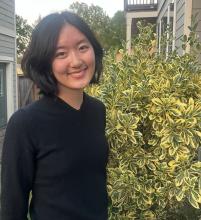 Dahna Kim in a residential courtyard