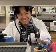 Jeremiah Myint works in the lab