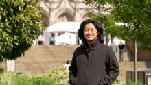 Jeremiah Myint on campus with Suzzallo Library in the background
