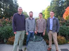 Four members of the BlueDot team on UW's campus