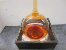 Large glass bulb of reddish bromine vapor