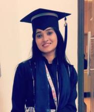 Hiba Mazhar in a graduation robe and mortar board cap