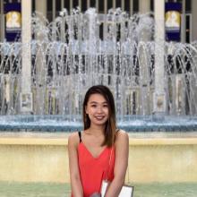 Madeline Wong in front of a fountain