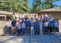 A group of more than 50 people pose for a photo