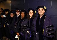 PhD graduates wait with anticipation for the commencement ceremony to begin
