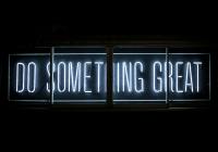 Neon sign that reads Do Something Great