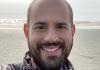 David Masiello with ocean shoreline behind him. 