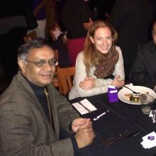 Four people at a dining table